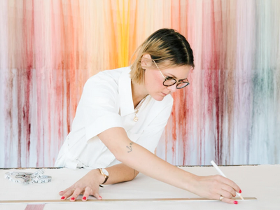 Nike Schroeder artist in Los Angeles with her colorful string art