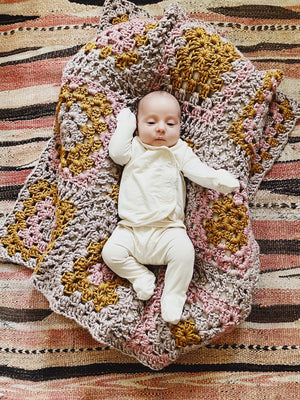 Emily Katz's baby, Palomino on the Granny Square Blanket made with 3mm Bamboo String