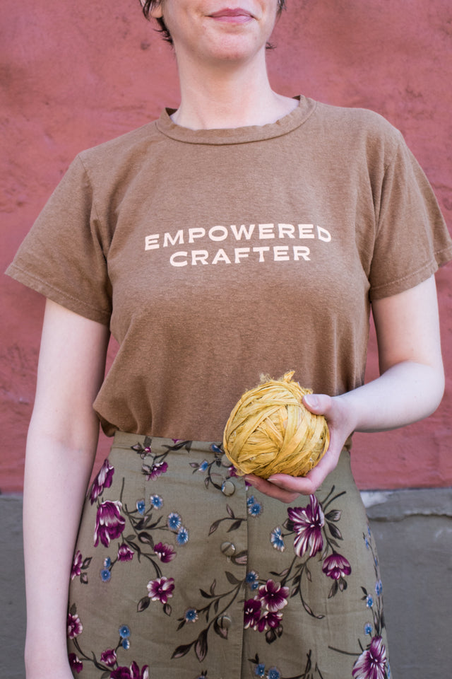 Courtney wearing the Empowered Crafter Tee in Small
